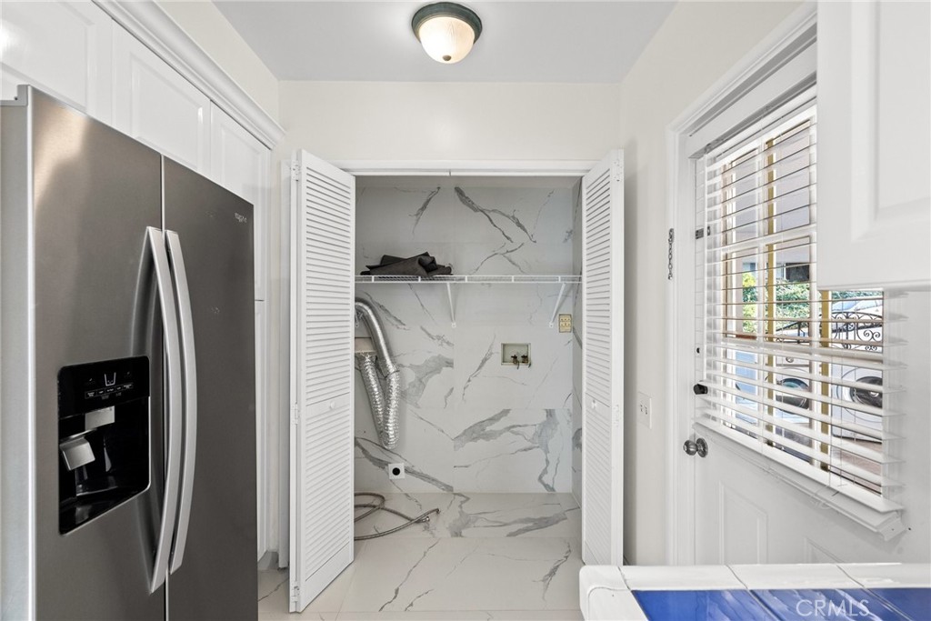 1519 Lynglen Drive Glendale, CA 91206 - Photo 16 of 39 a bathroom with a shower and a glass door
