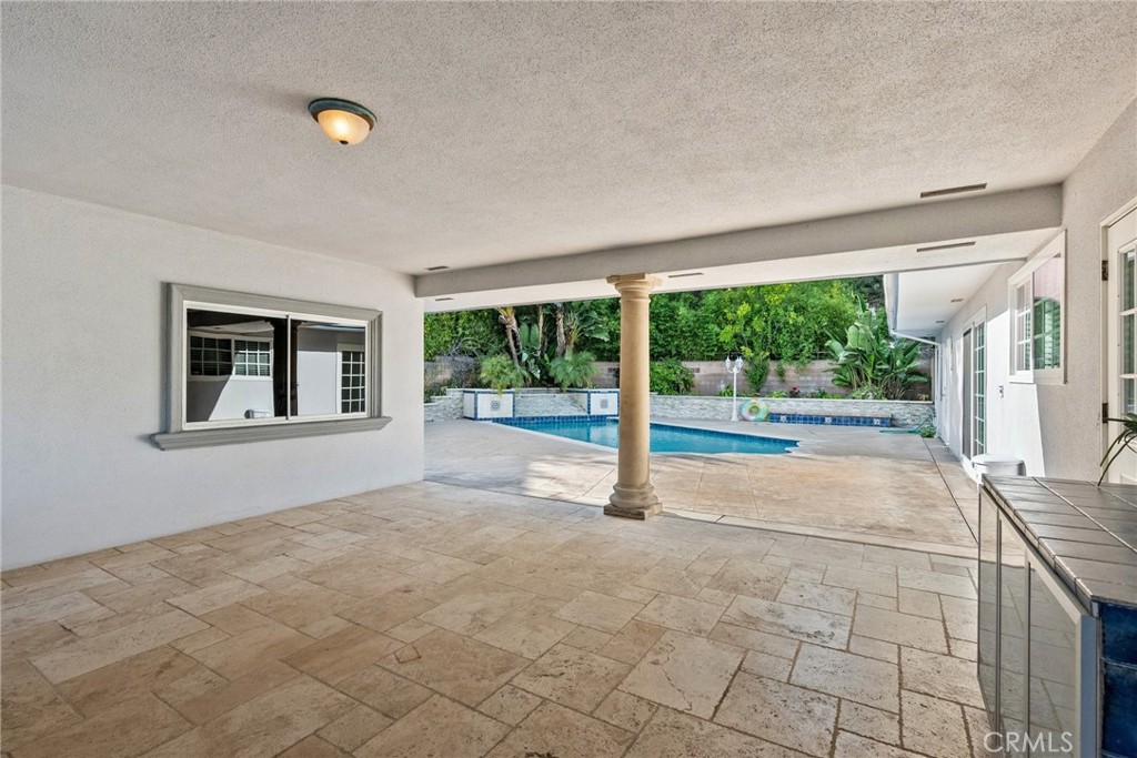 1519 Lynglen Drive Glendale, CA 91206 - Photo 32 of 39 a view of an empty room with windows and yard