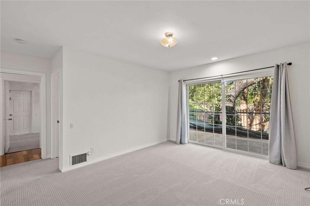 1519 Lynglen Drive Glendale, CA 91206 - Photo 4 of 39 a view of an empty room with a window