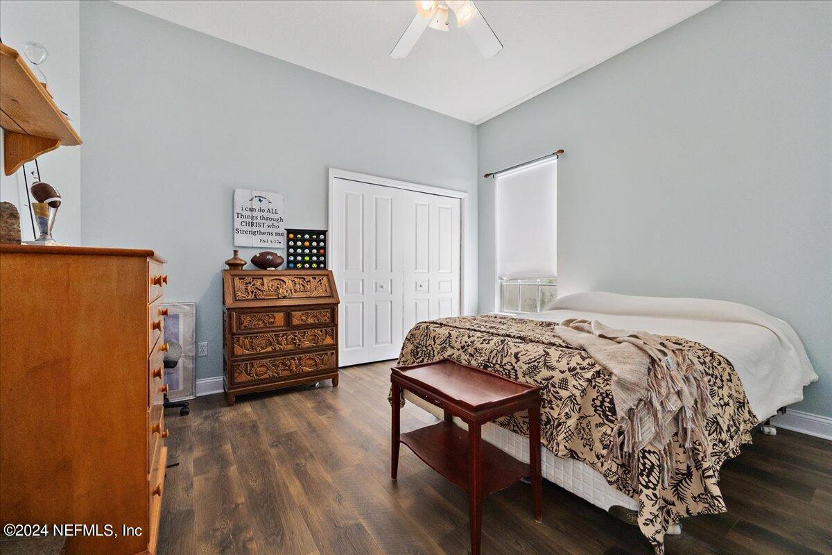 757 Eagle Point Drive St. Augustine, FL 32092 - Photo 20 of 44 a bedroom with a bed and a dresser