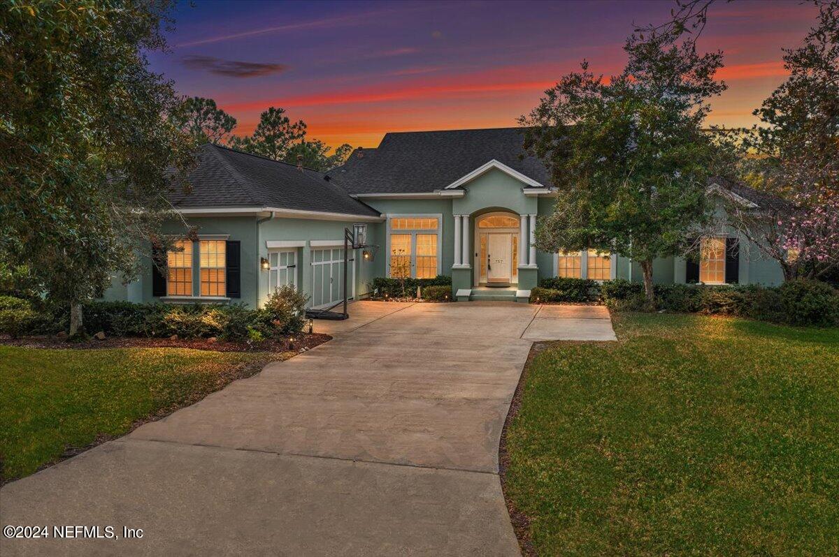 757 Eagle Point Drive St. Augustine, FL 32092 - Photo 30 of 44 a front view of a house with a yard