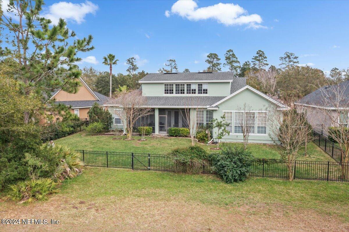 757 Eagle Point Drive St. Augustine, FL 32092 - Photo 31 of 44 a front view of a house with garden