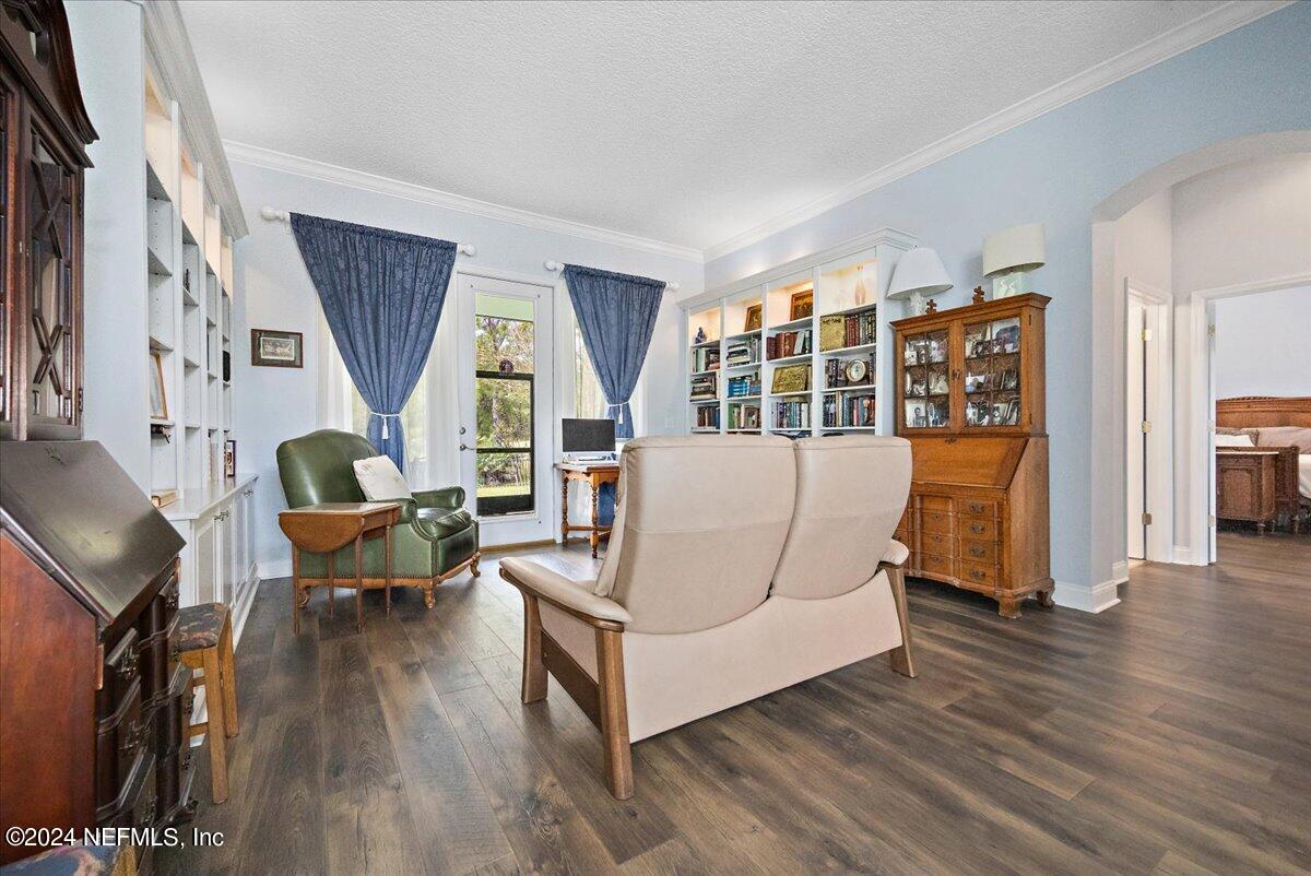 757 Eagle Point Drive St. Augustine, FL 32092 - Photo 6 of 44 a living room with furniture and wooden floor