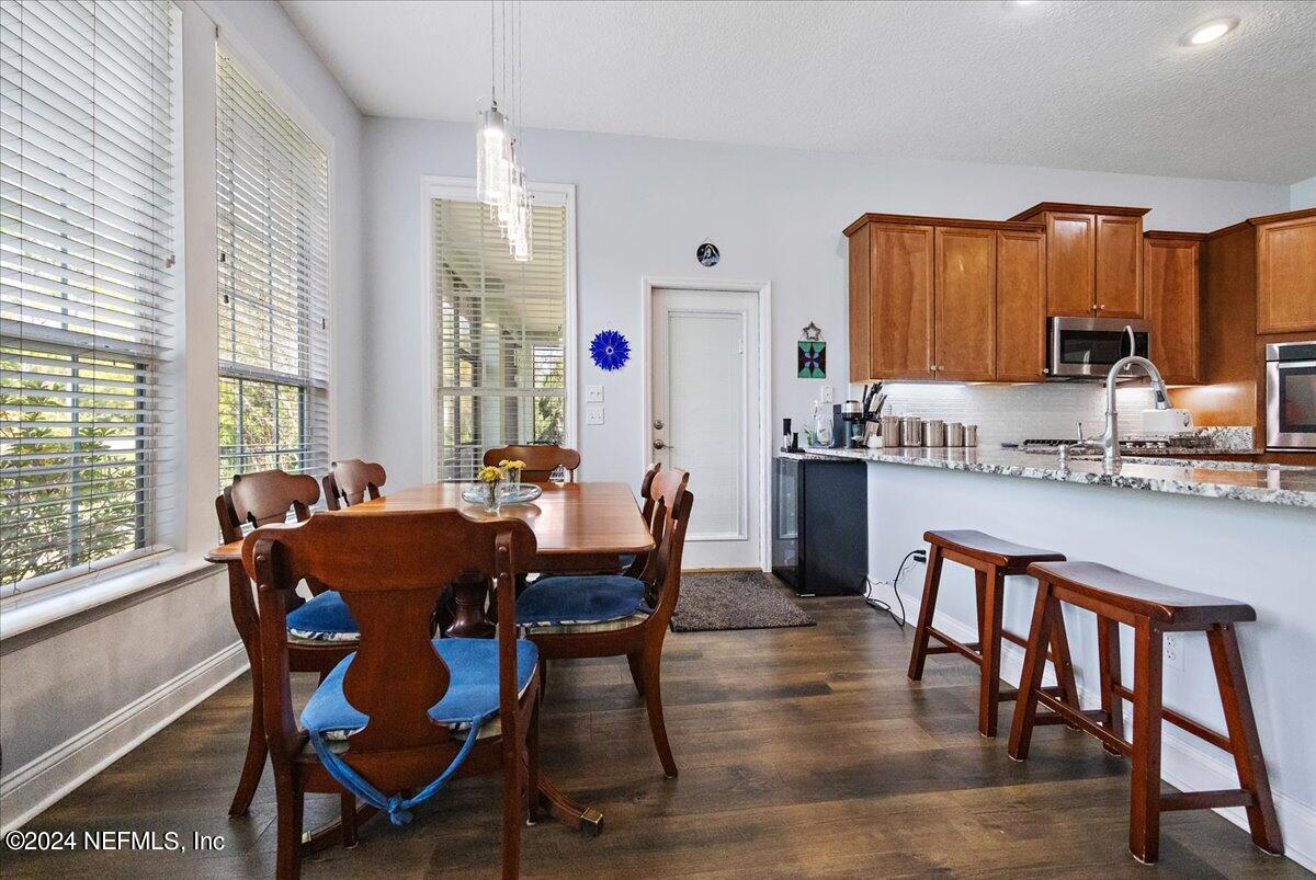 757 Eagle Point Drive St. Augustine, FL 32092 - Photo 10 of 44 a dining room with furniture and window
