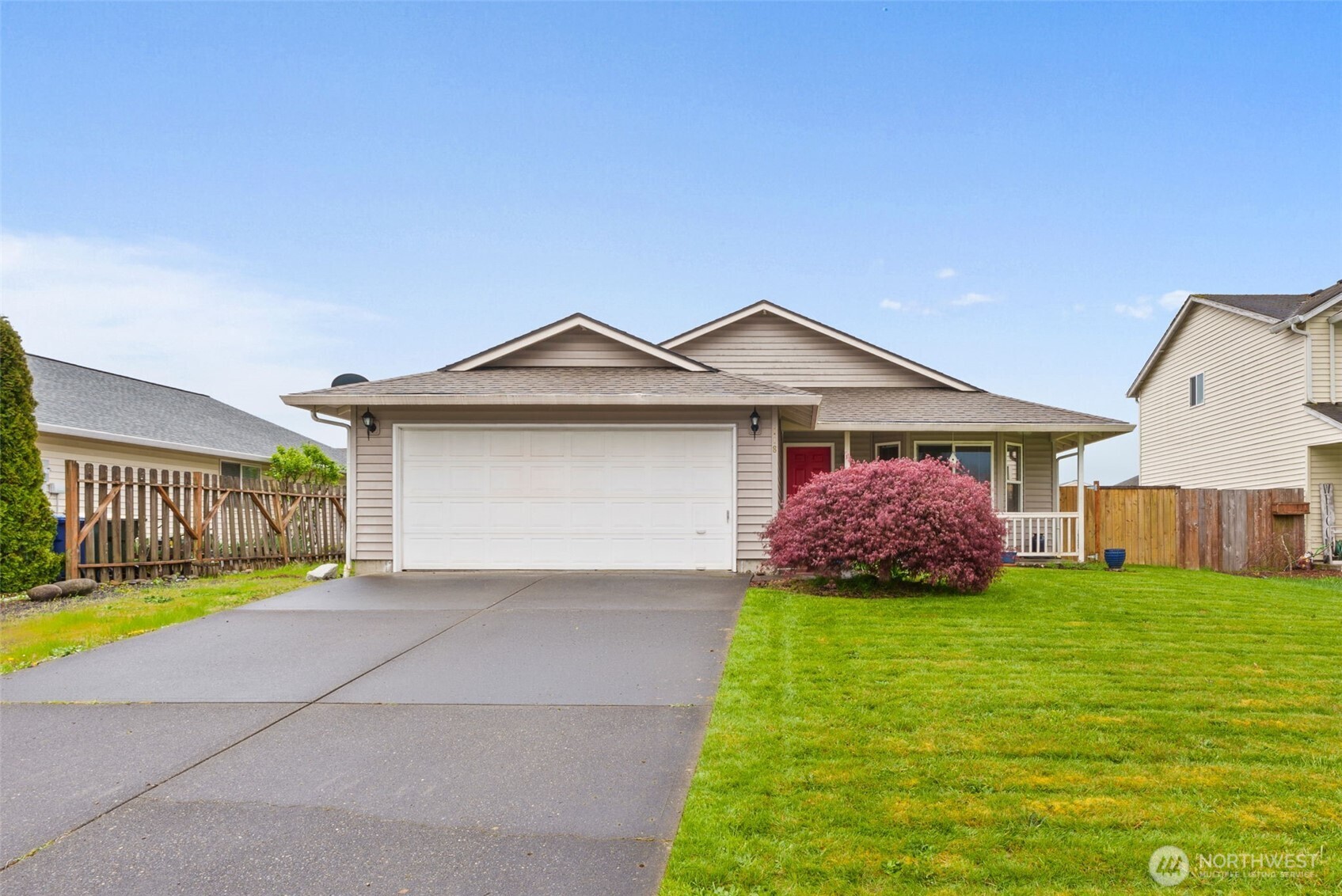 118 Rose Marie Drive Chehalis, WA 98532 - Photo 2 of 27 a front view of a house with a yard and garage