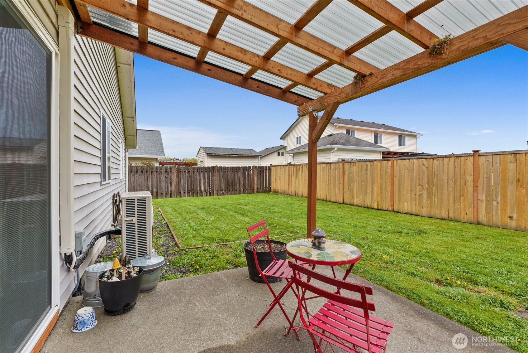 118 Rose Marie Drive Chehalis, WA 98532 - Photo 24 of 27 a backyard of a house with table and chairs