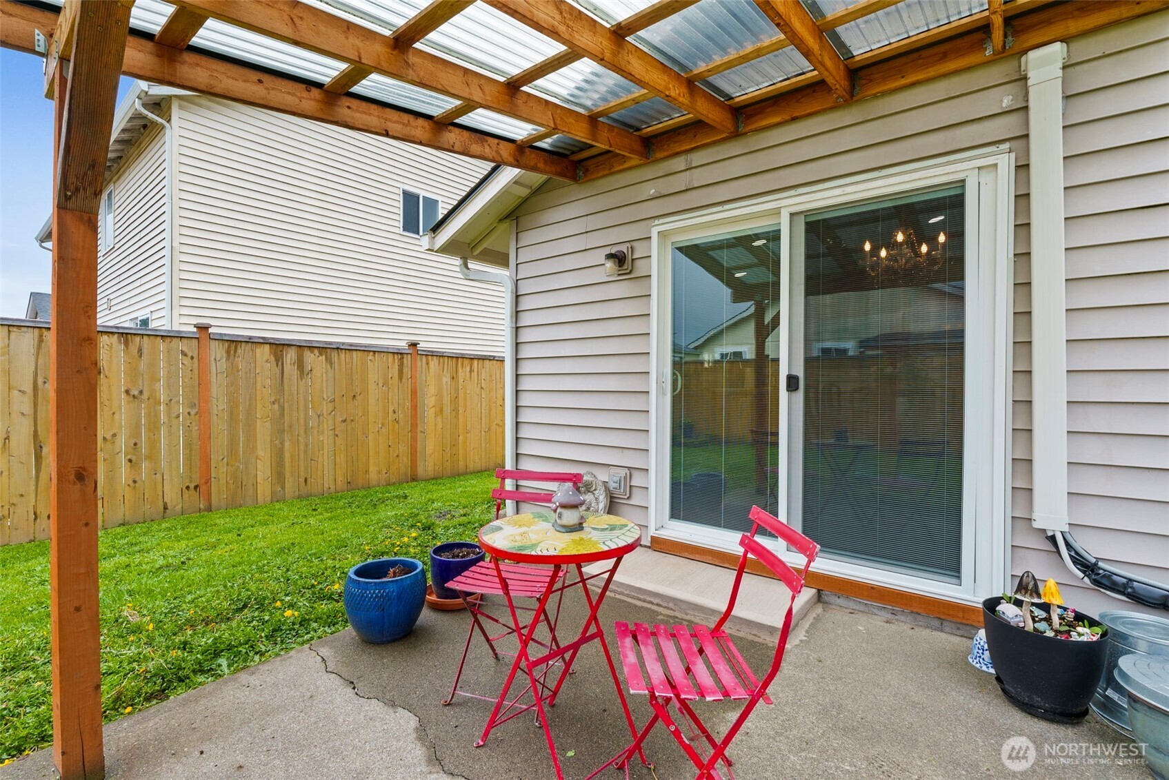 118 Rose Marie Drive Chehalis, WA 98532 - Photo 25 of 27 a backyard of a house with outdoor seating