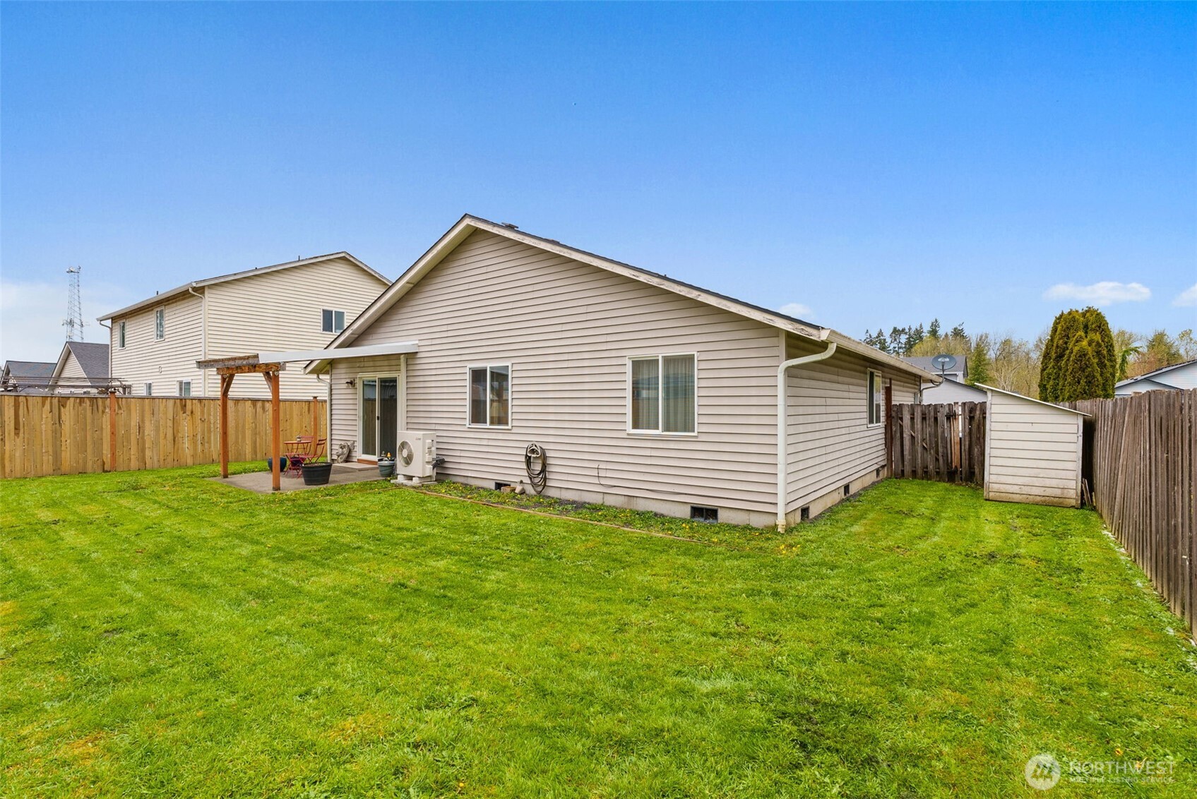 118 Rose Marie Drive Chehalis, WA 98532 - Photo 26 of 27 a view of a backyard with plants and large tree