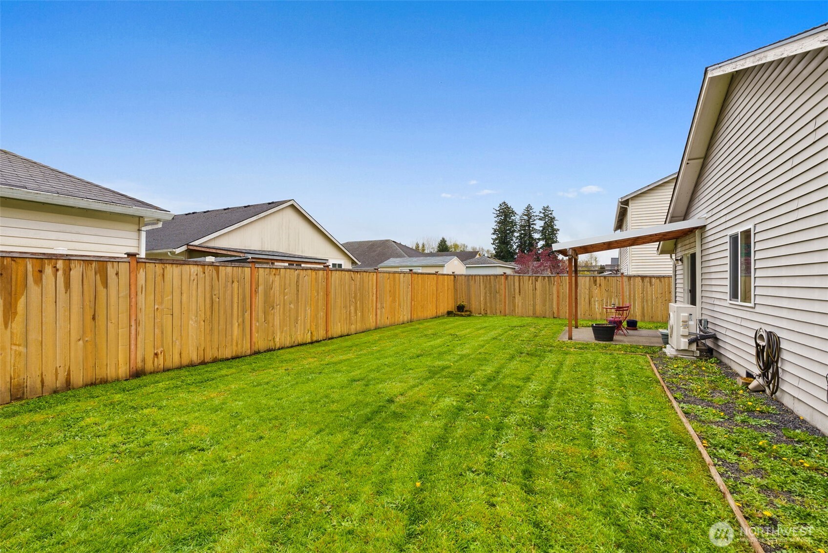 118 Rose Marie Drive Chehalis, WA 98532 - Photo 27 of 27 a view of a backyard with a garden