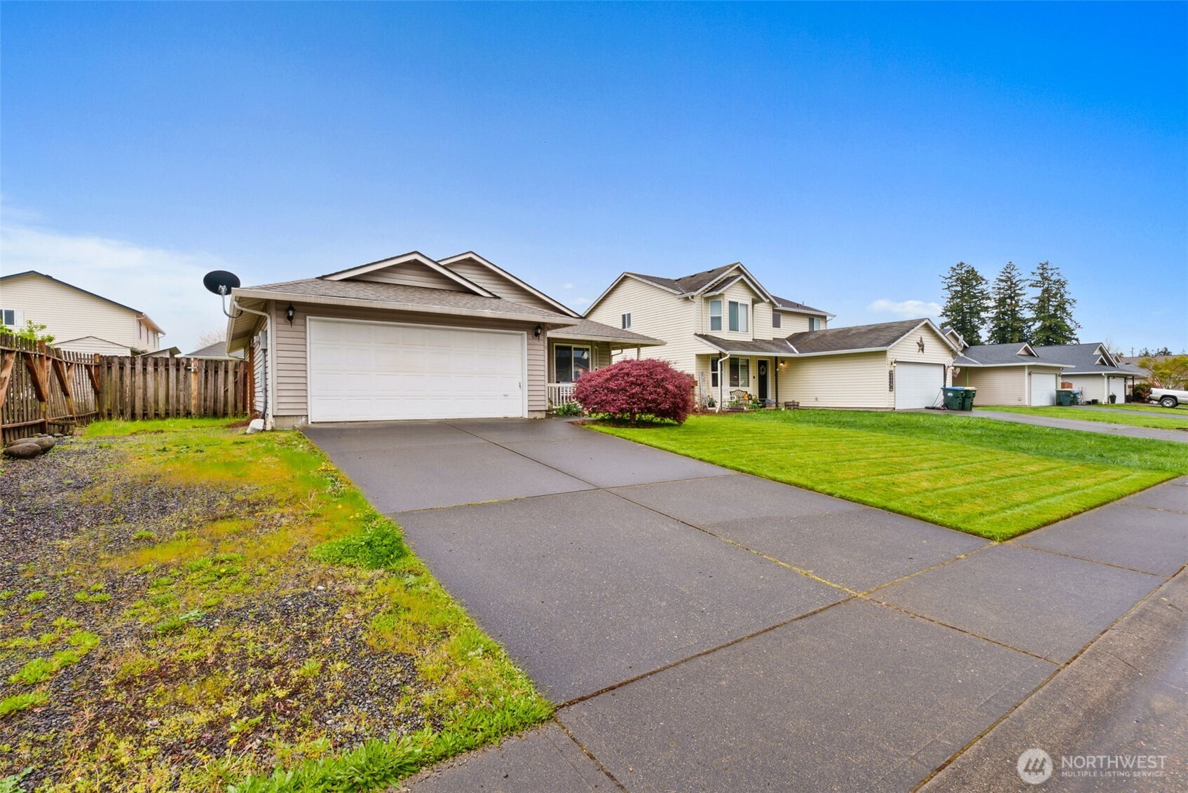 118 Rose Marie Drive Chehalis, WA 98532 - Photo 3 of 27 a front view of a house with a garden and yard