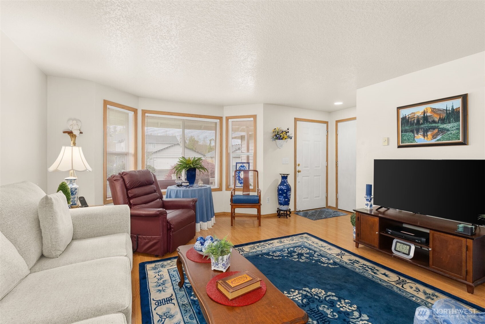 118 Rose Marie Drive Chehalis, WA 98532 - Photo 8 of 27 a living room with furniture and a flat screen tv