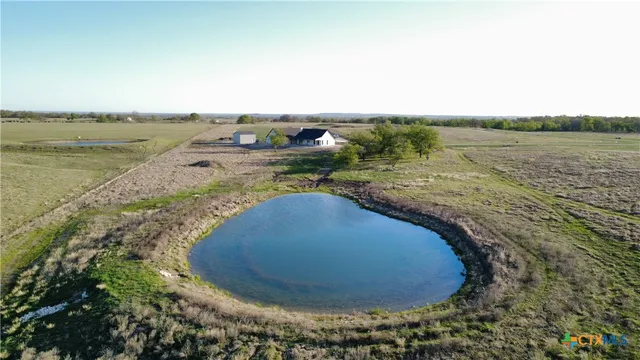 a view of a lake with a outdoor space