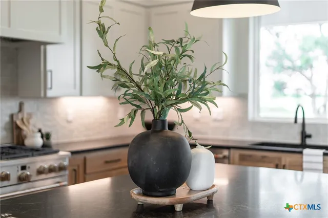 a vase of flowers sitting on a table