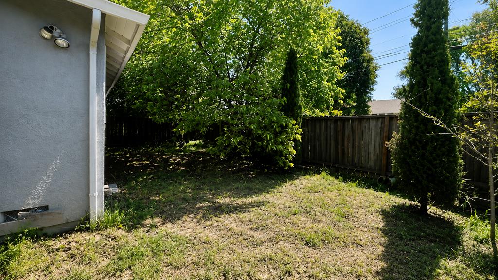 1281 Traynor Road Concord, CA 94520 - Photo 31 of 41 a backyard of a house with lots of green space