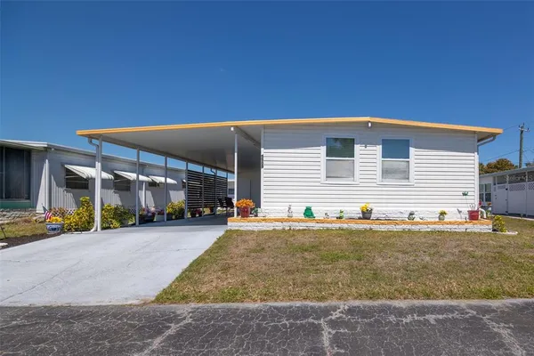 a front view of a house with a garage