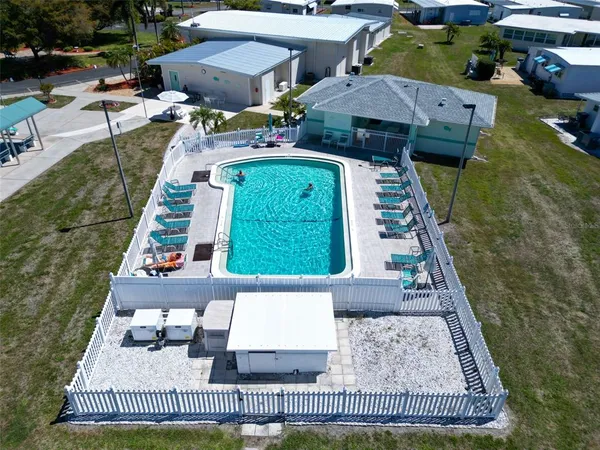 an aerial view of a house with a garden