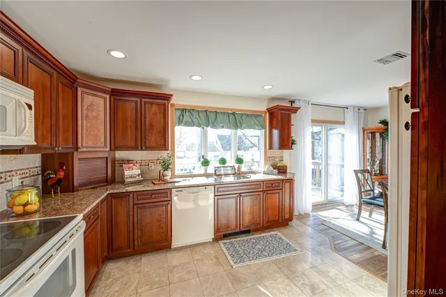 $710,000 | 928 Peconic Avenue, West Babylon, NY 11704