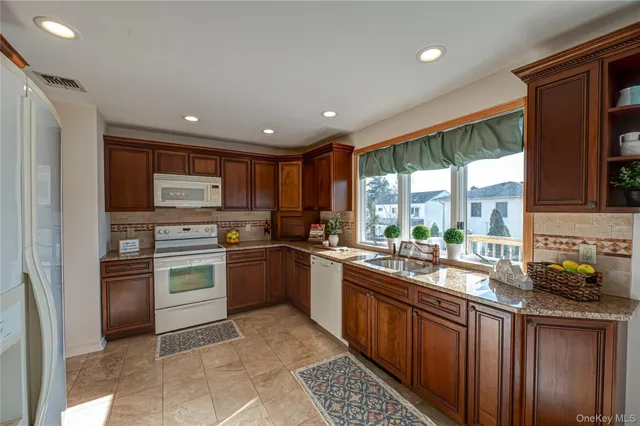 $710,000 | 928 Peconic Avenue, West Babylon, NY 11704