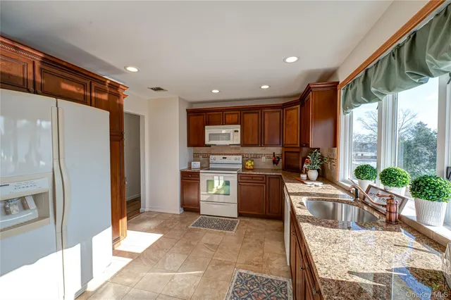 $710,000 | 928 Peconic Avenue, West Babylon, NY 11704