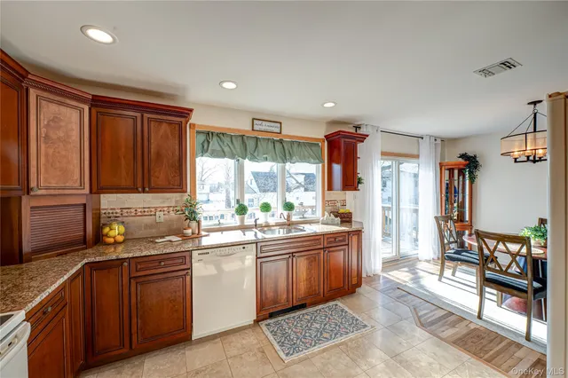 $710,000 | 928 Peconic Avenue, West Babylon, NY 11704