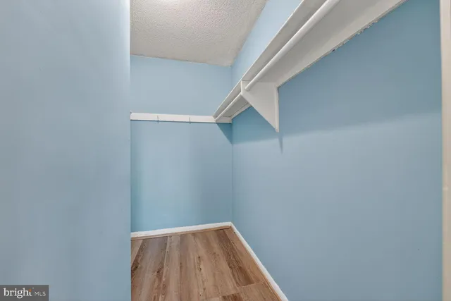 a view of small space with racks on the wall