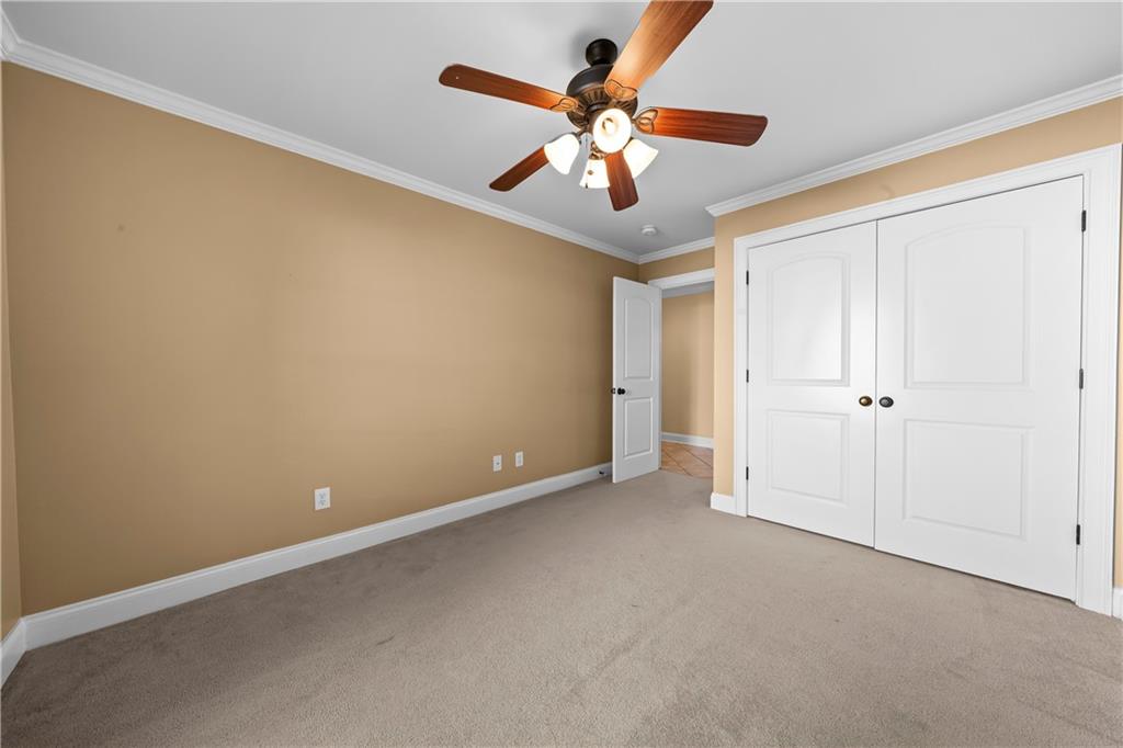 23 Walton Creek Drive Southwest Rome, GA 30165 - Photo 14 of 35 an empty room with chandelier fan