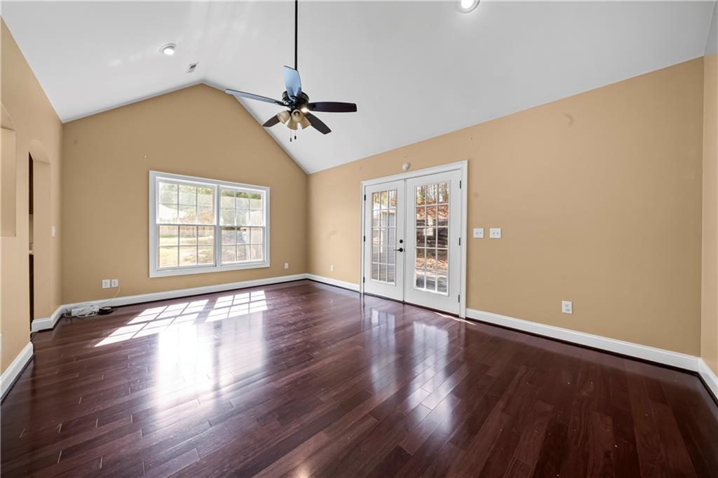23 Walton Creek Drive Southwest Rome, GA 30165 - Photo 21 of 35 a view of an empty room with wooden floor and a window