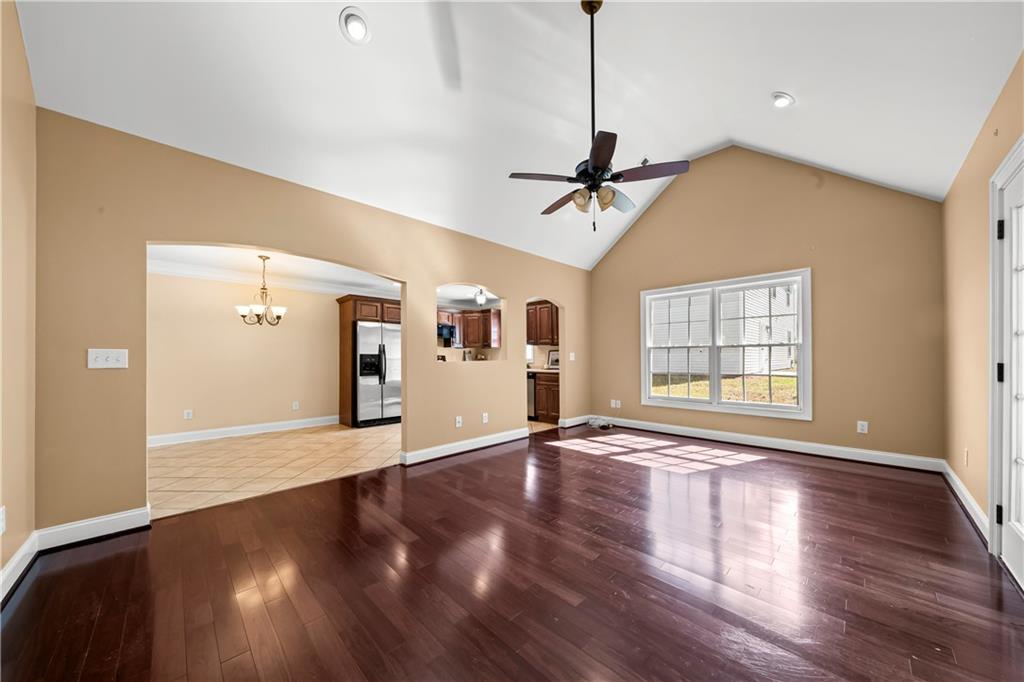 23 Walton Creek Drive Southwest Rome, GA 30165 - Photo 23 of 35 a view of an empty room with wooden floor and a window