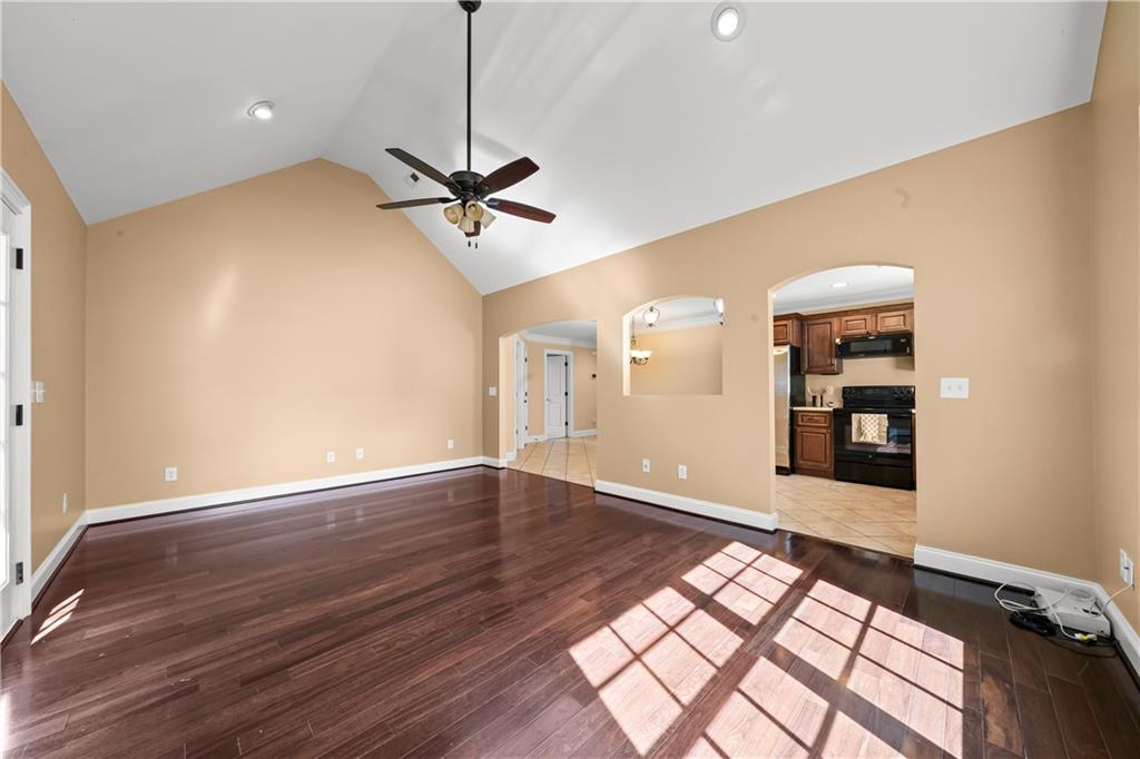 23 Walton Creek Drive Southwest Rome, GA 30165 - Photo 24 of 35 a view of an empty room with window and wooden floor