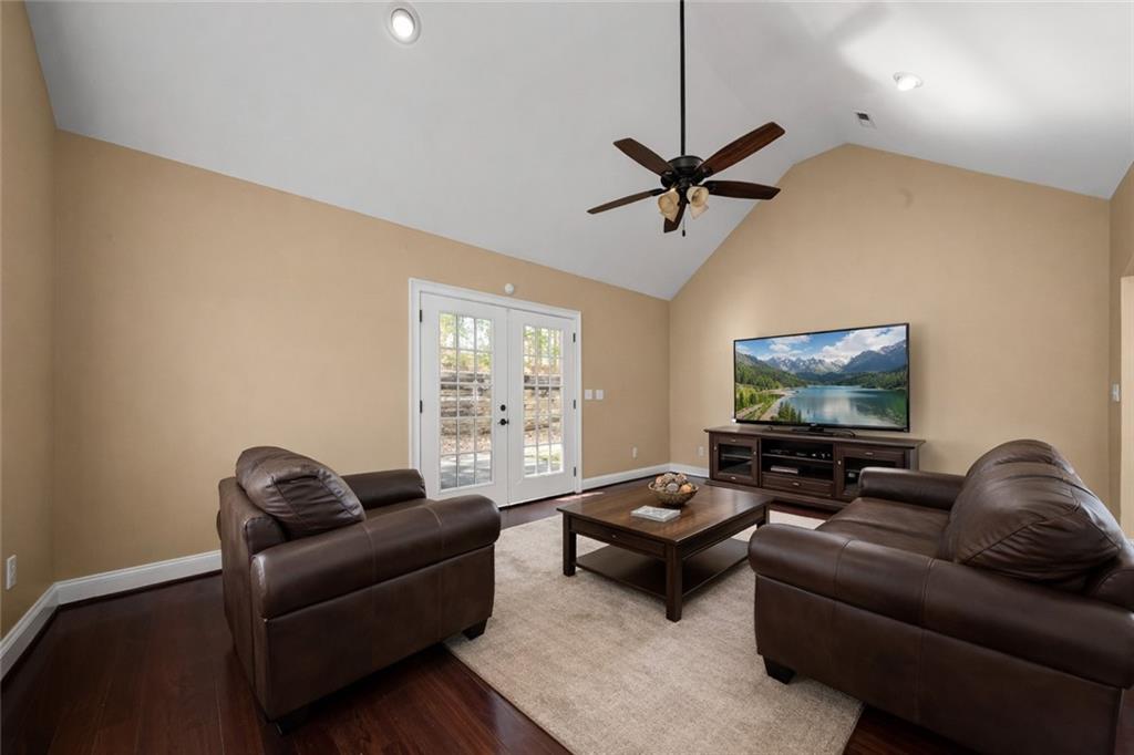 23 Walton Creek Drive Southwest Rome, GA 30165 - Photo 25 of 35 a living room with furniture a ceiling fan and a window