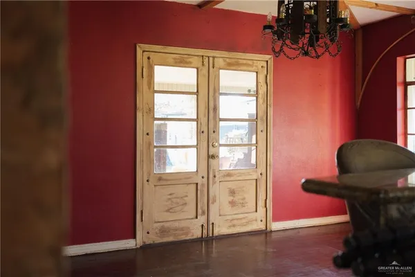 a view of an empty room and window