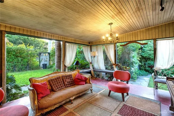 a outdoor living space with furniture and garden view