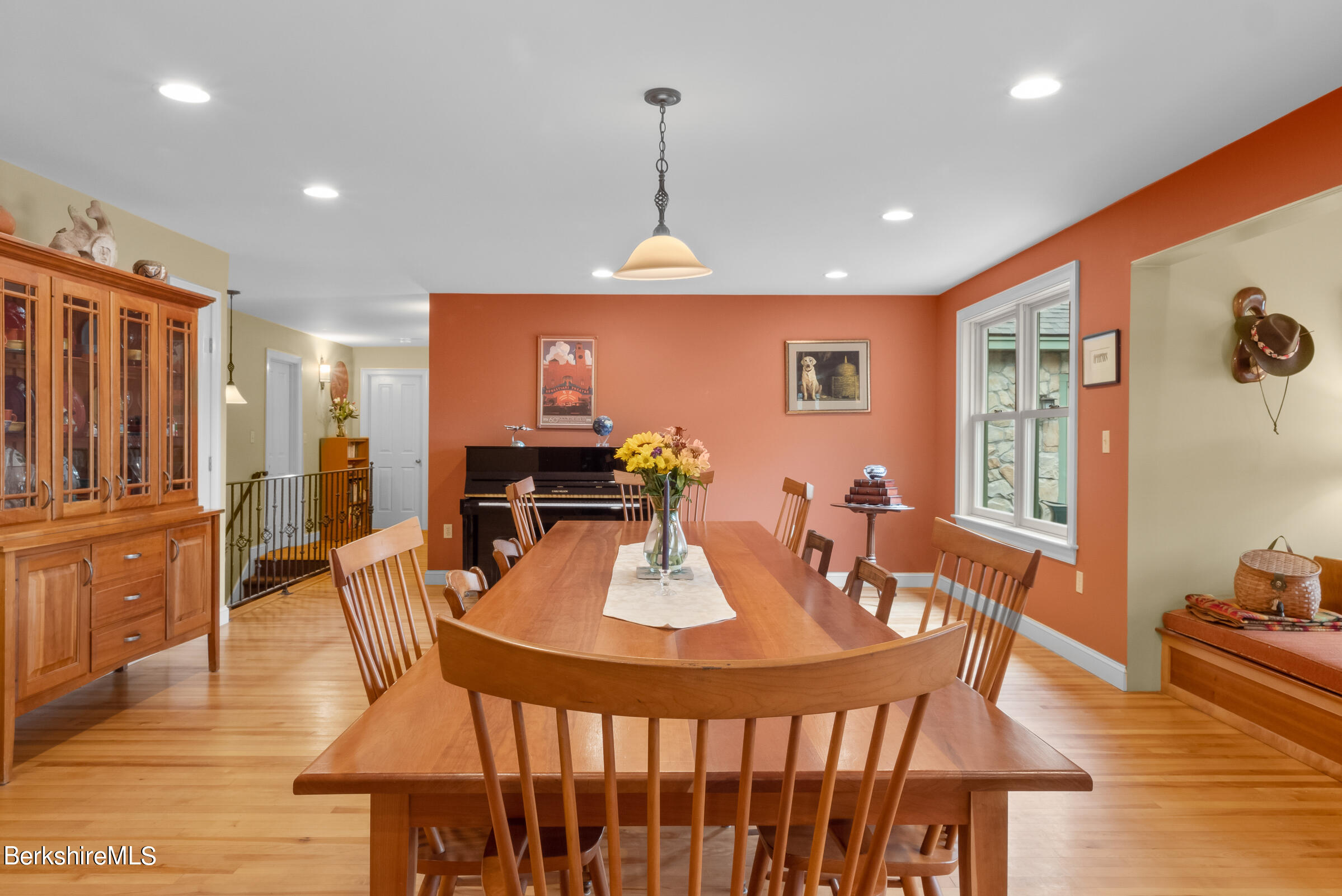 10 Antin Road Chesterfield, MA 01012 - Photo 11 of 36 a dining room with furniture a chandelier and wooden floor