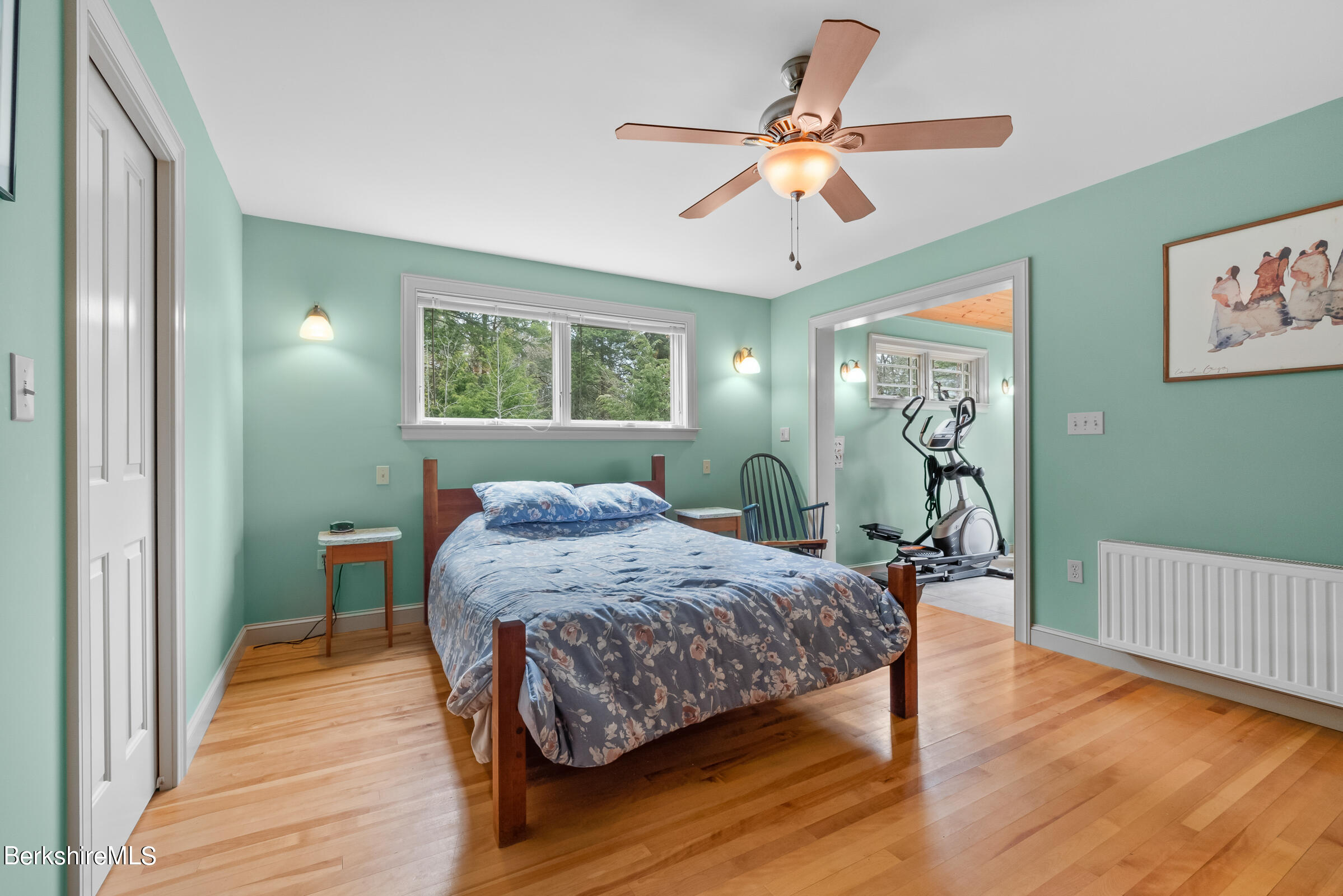 10 Antin Road Chesterfield, MA 01012 - Photo 16 of 36 a bedroom with a bed and a chandelier