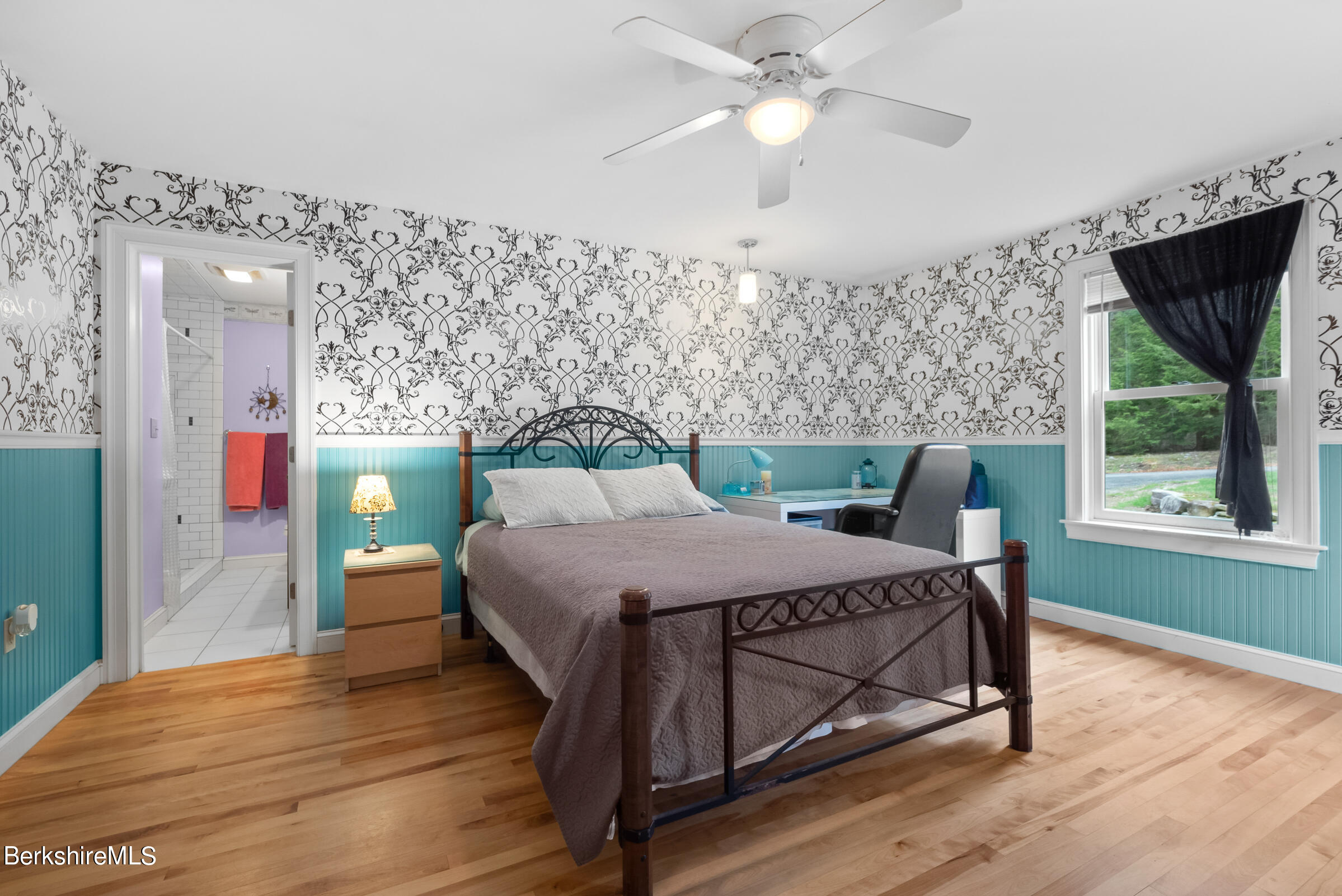 10 Antin Road Chesterfield, MA 01012 - Photo 19 of 36 a bedroom with a bed a chandelier and a dresser