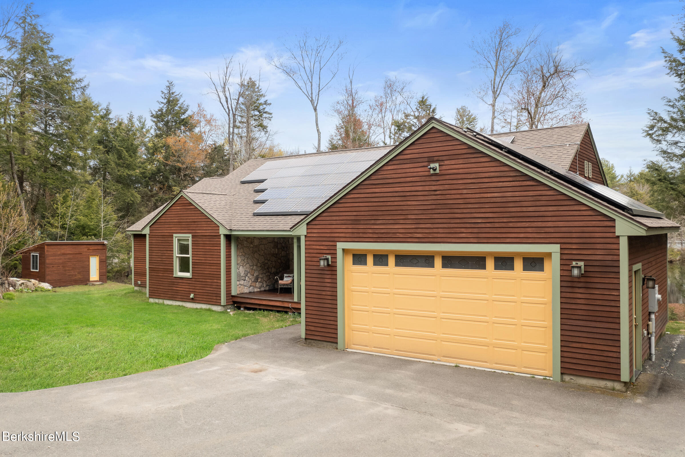 10 Antin Road Chesterfield, MA 01012 - Photo 28 of 36 a front view of a house with a garden and yard