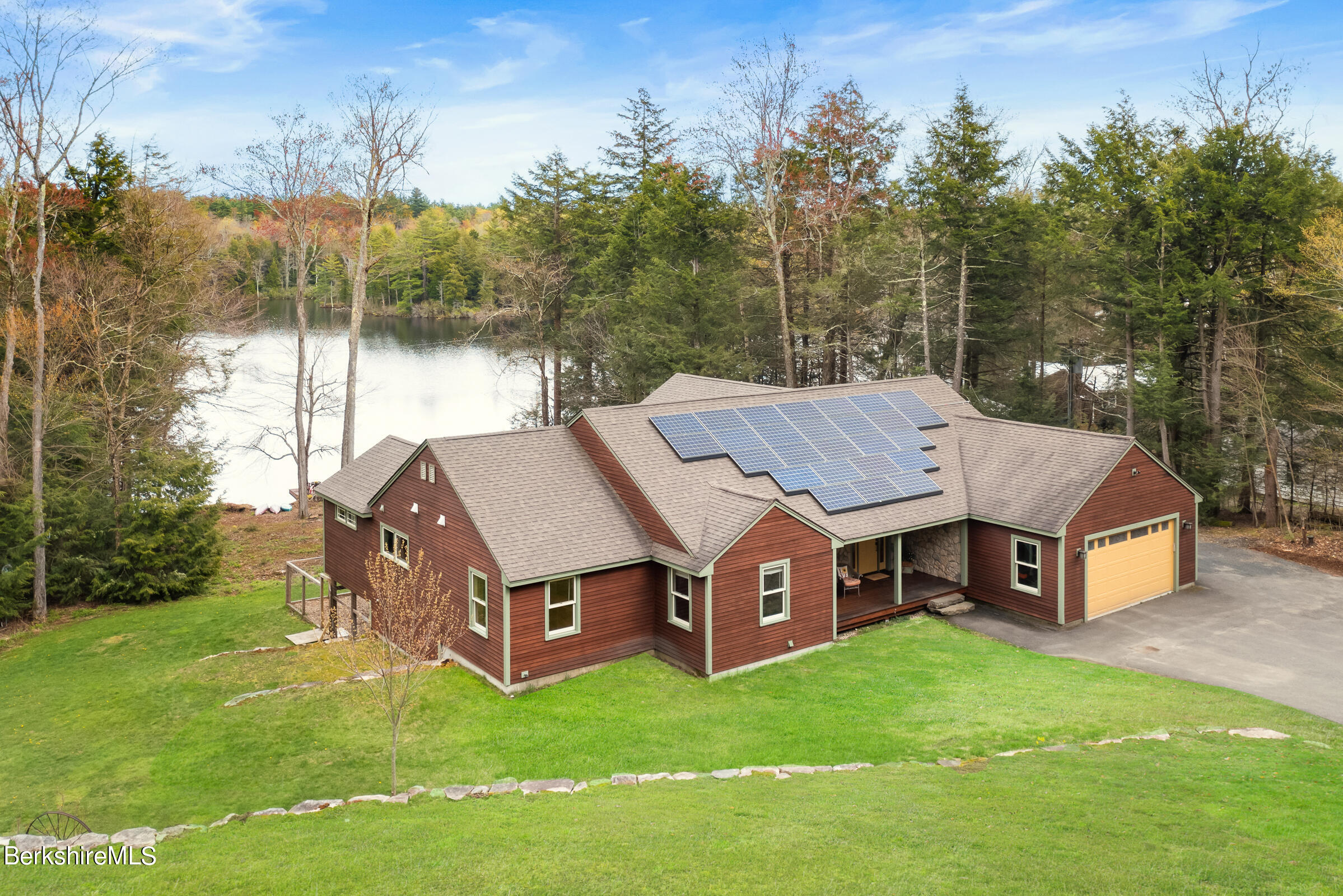 10 Antin Road Chesterfield, MA 01012 - Photo 4 of 36 a aerial view of a house with a big yard and large trees