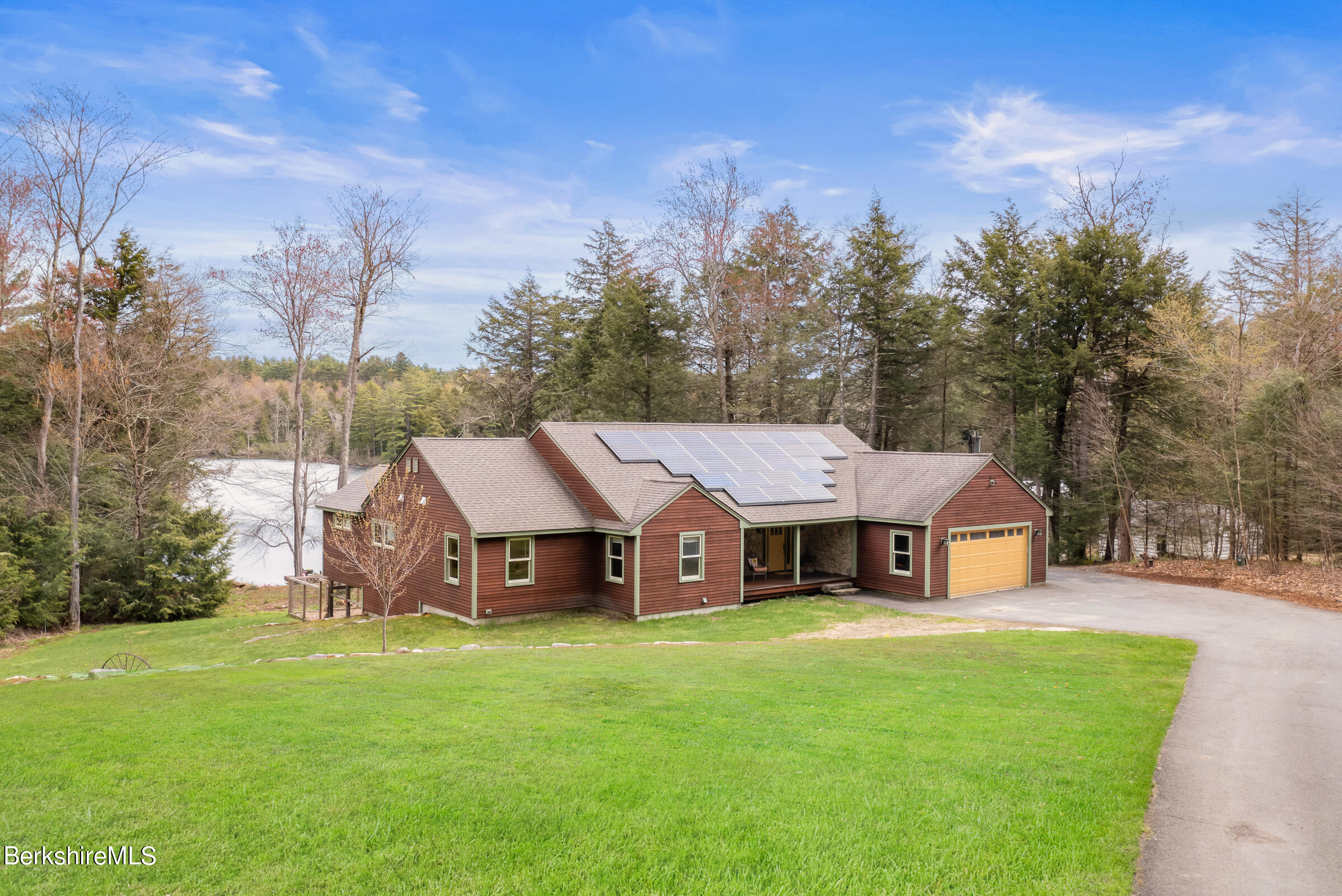 10 Antin Road Chesterfield, MA 01012 - Photo 5 of 36 a aerial view of a house with a big yard and large trees