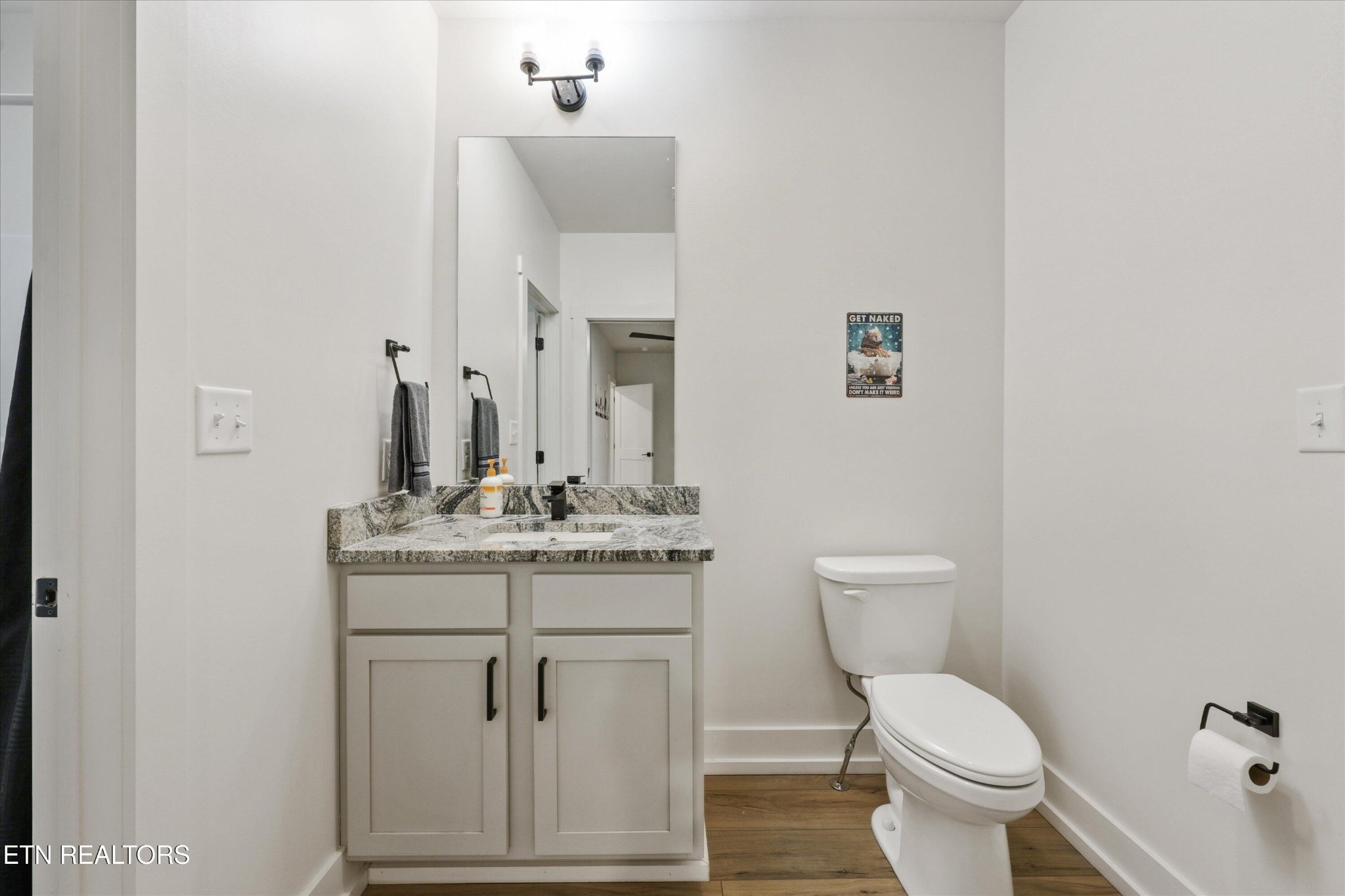 418 Fleeta Williams Way Sevierville, TN 37862 - Photo 21 of 39 a bathroom with a toilet sink and mirror