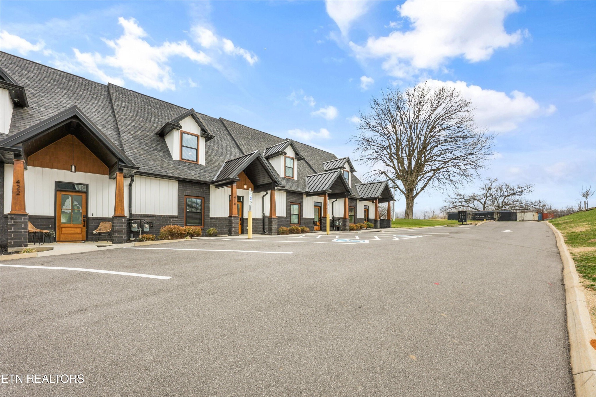 418 Fleeta Williams Way Sevierville, TN 37862 - Photo 30 of 39 a front view of a building with a lot of trees