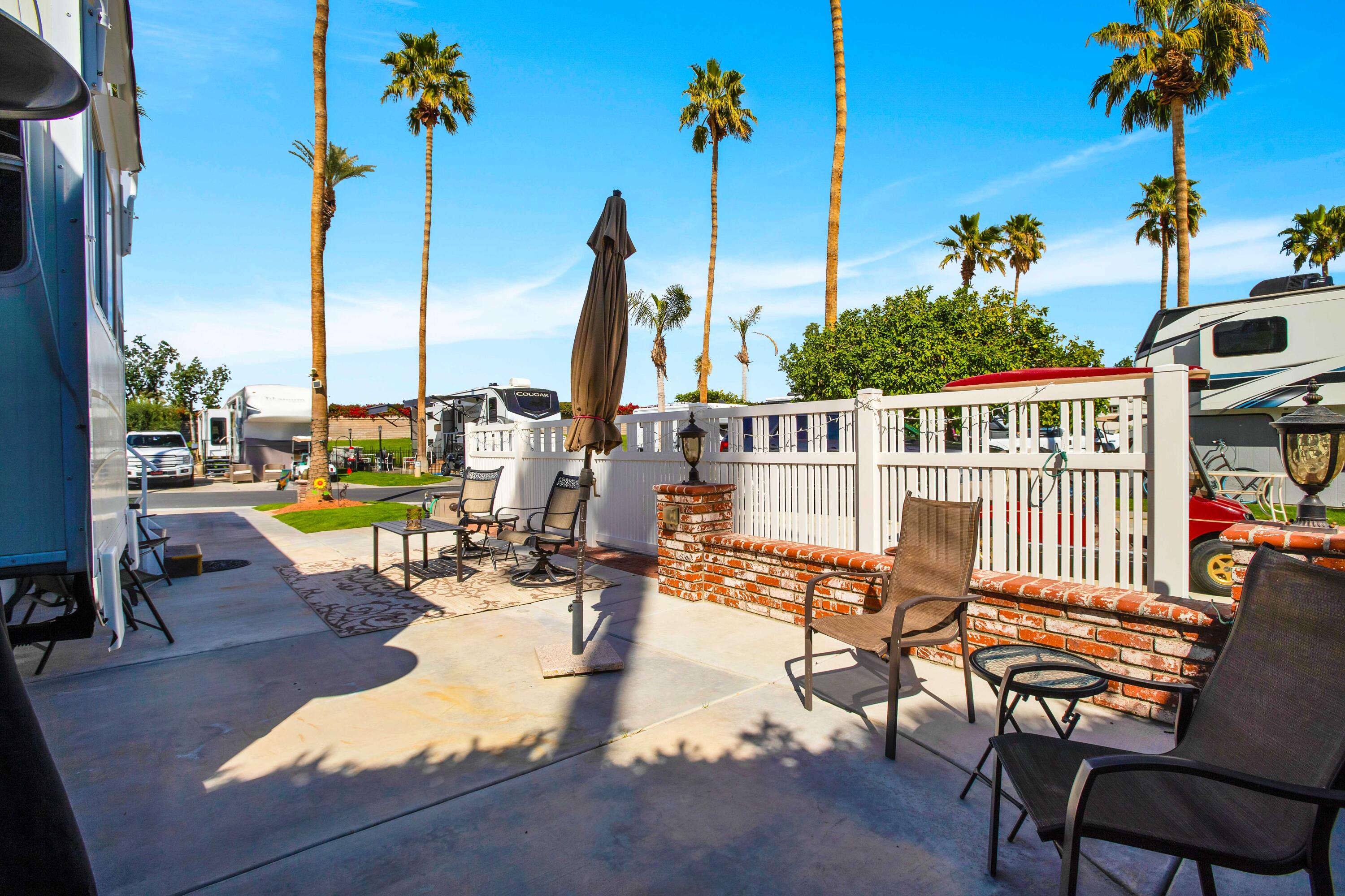 69411 Ramon Road, Unit 463 Cathedral City, CA 92234 - Photo 17 of 52 a view of a swimming pool with a lounge chairs