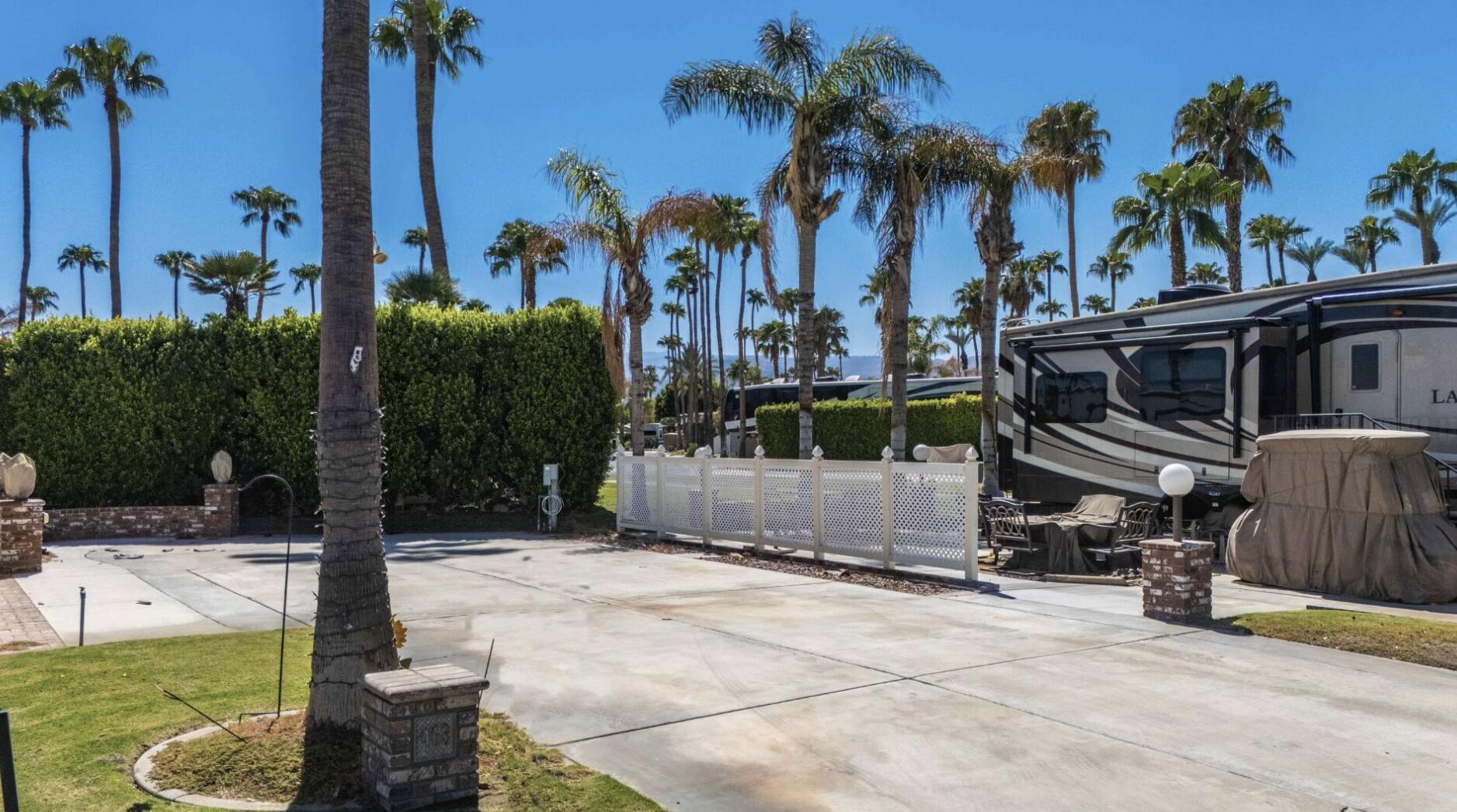 69411 Ramon Road, Unit 463 Cathedral City, CA 92234 - Photo 3 of 52 a front view of a house with palm trees