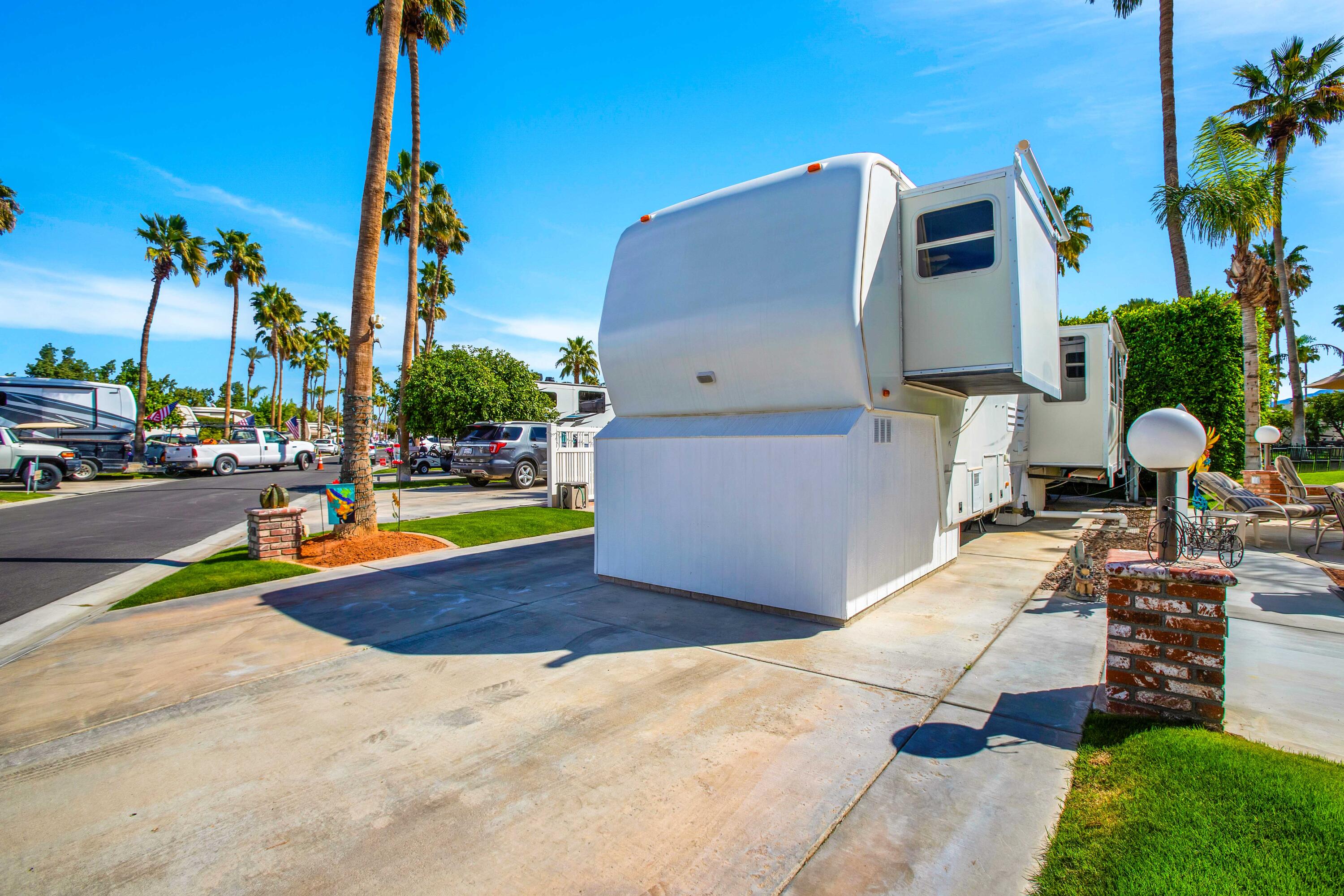 69411 Ramon Road, Unit 463 Cathedral City, CA 92234 - Photo 8 of 52 a view of a swimming pool with a patio and a yard