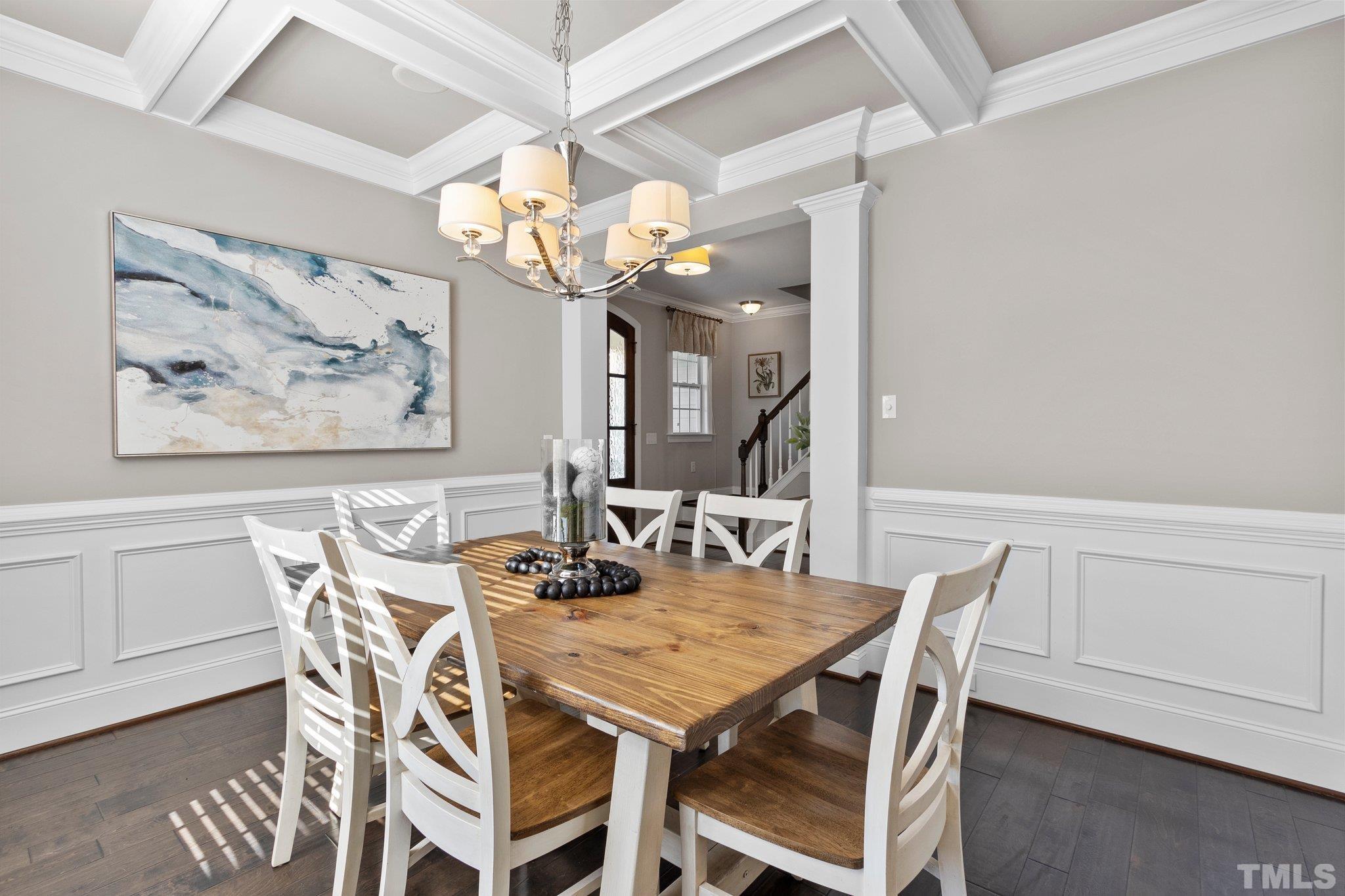 2830 Riley's Pond Drive Apex, NC 27502 - Photo 11 of 54 a view of a dining room with furniture and a chandelier fan