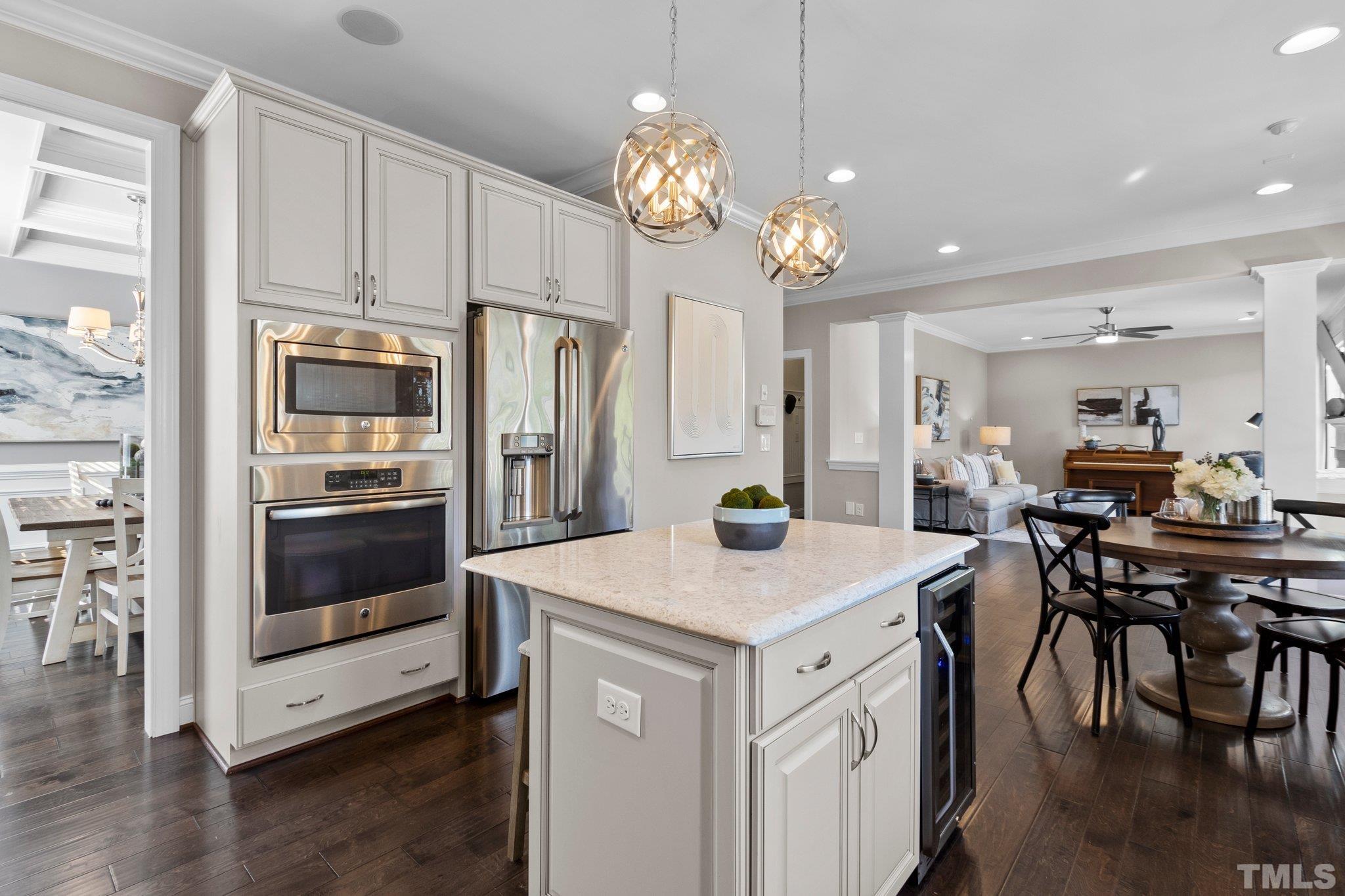 2830 Riley's Pond Drive Apex, NC 27502 - Photo 16 of 54 a kitchen that has a lot of counter space and appliances
