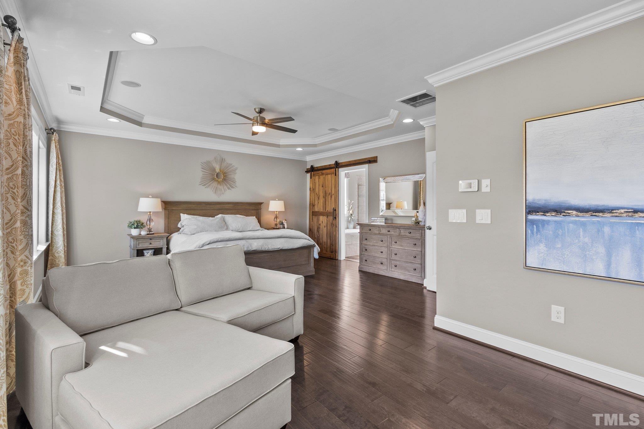 2830 Riley's Pond Drive Apex, NC 27502 - Photo 29 of 54 a living room with furniture and wooden floor