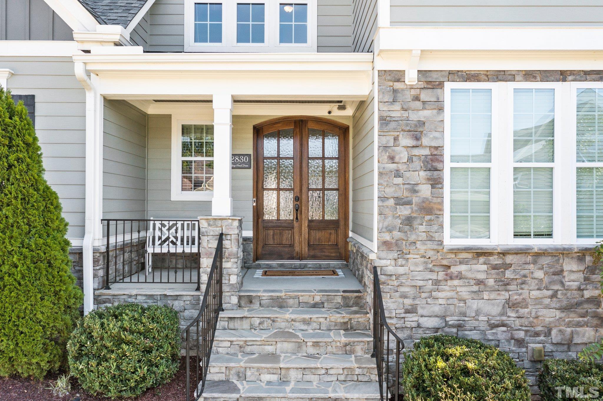 2830 Riley's Pond Drive Apex, NC 27502 - Photo 3 of 54 a front view of a house