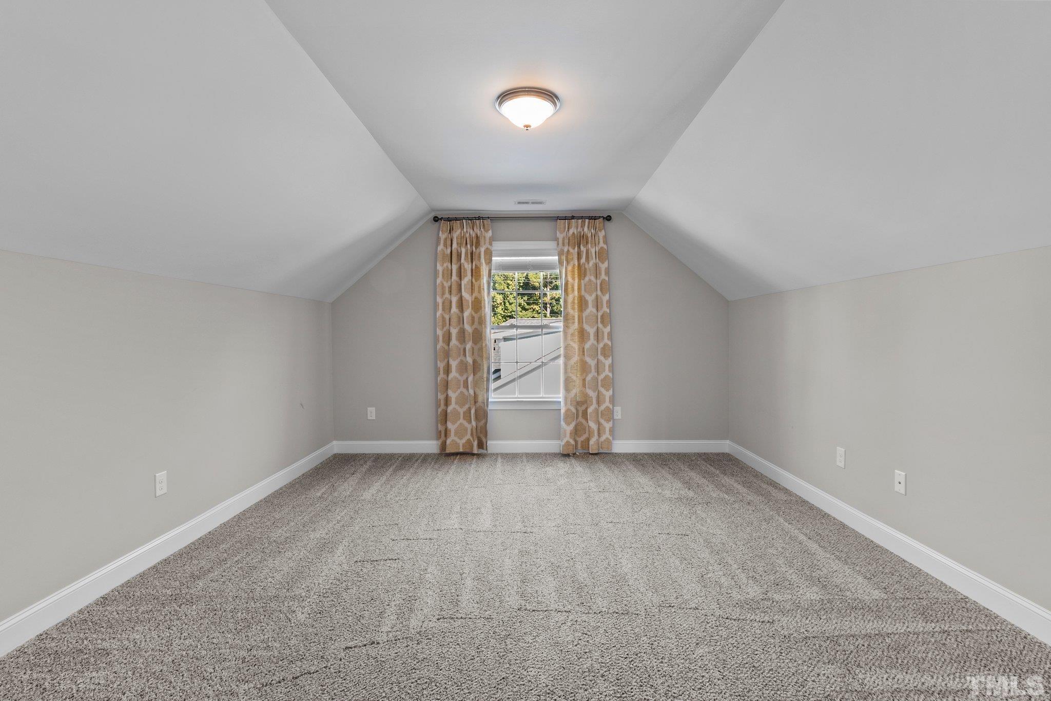 2830 Riley's Pond Drive Apex, NC 27502 - Photo 32 of 54 an empty room with windows