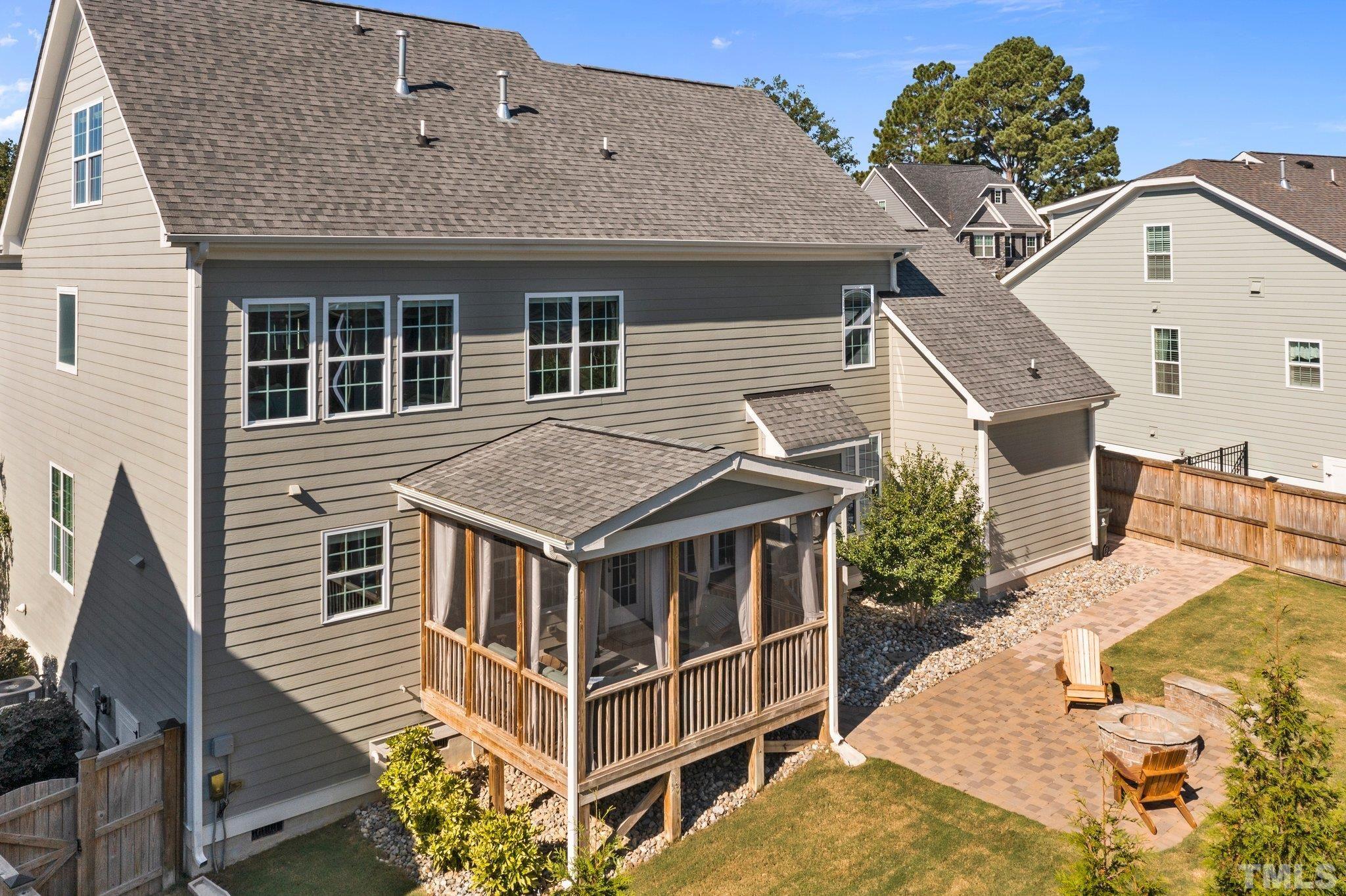 2830 Riley's Pond Drive Apex, NC 27502 - Photo 40 of 54 a front view of a house with a yard