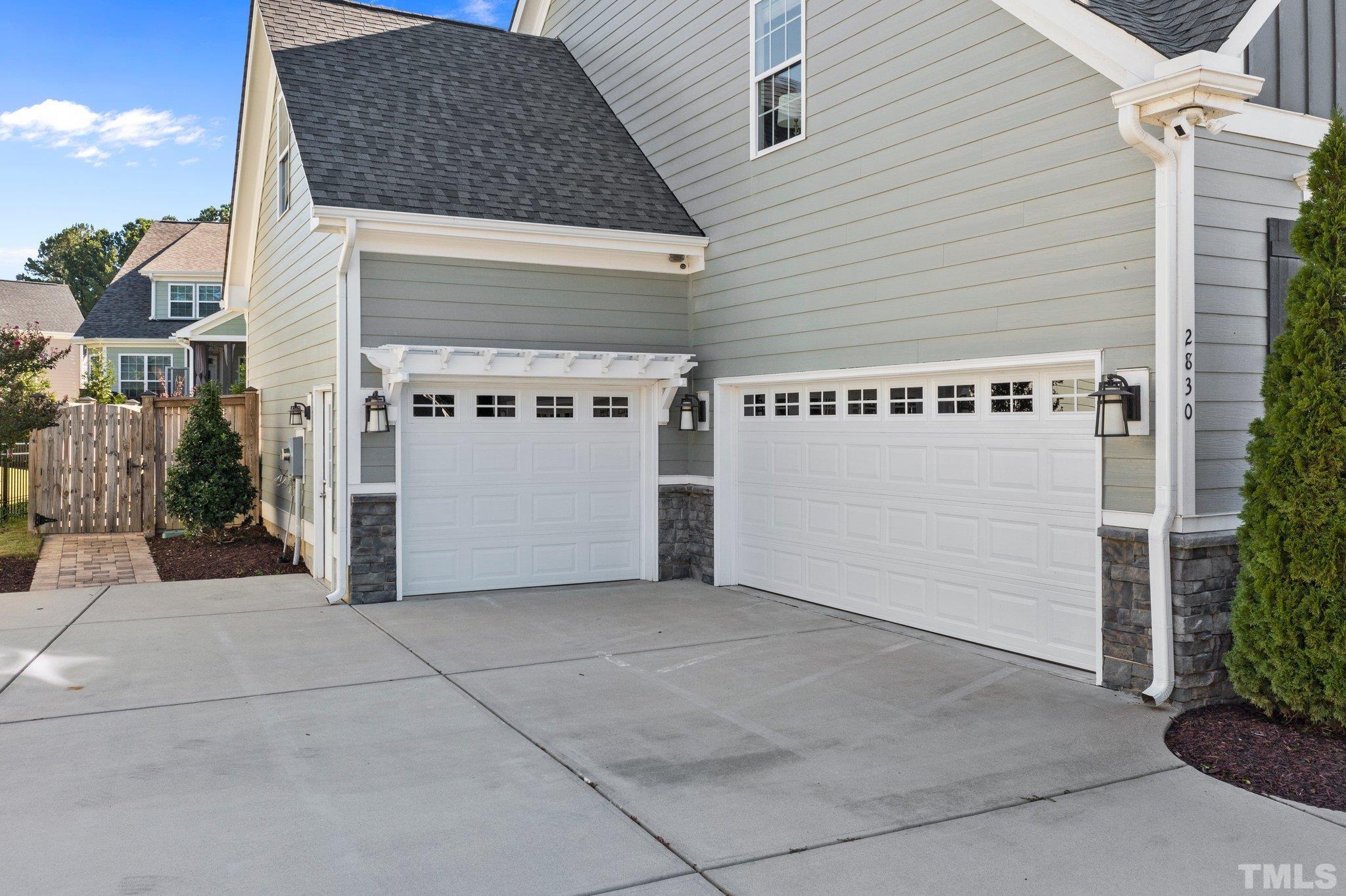 2830 Riley's Pond Drive Apex, NC 27502 - Photo 49 of 54 a view of a wooden house with a street